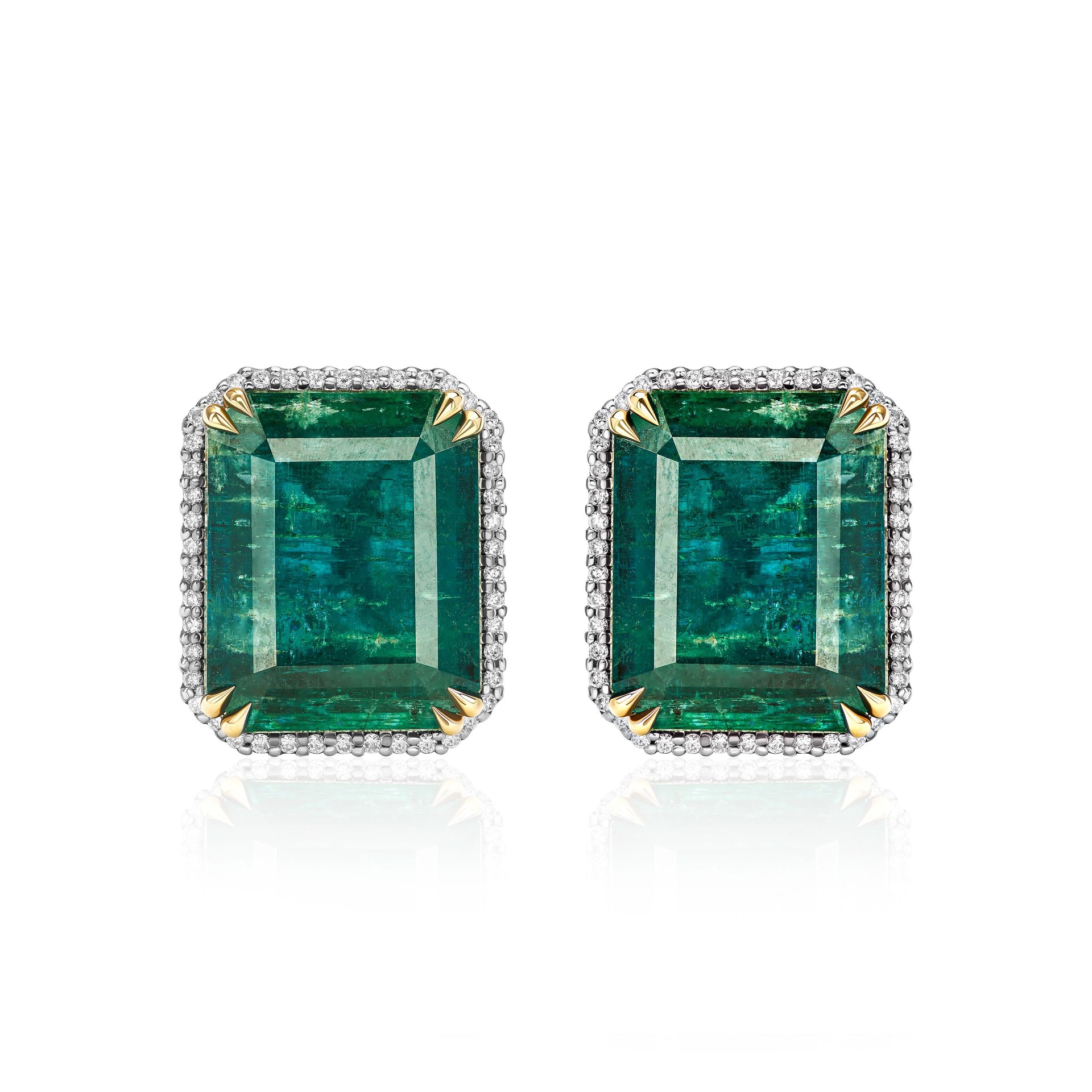 Пусеты из белого золота с изумрудами 20.43 карата.