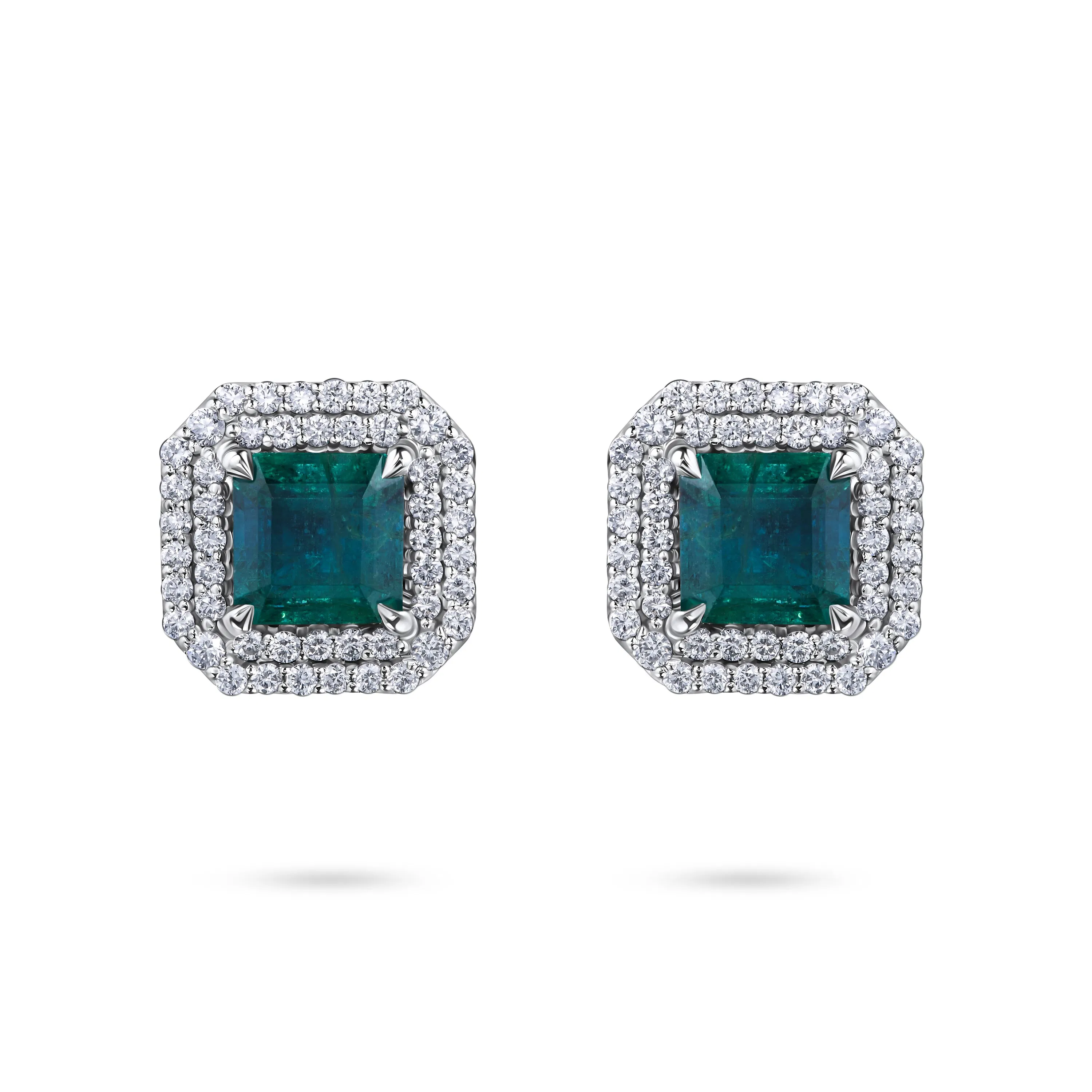 Пусеты из белого золота с изумрудами 1.33 и 1.23 карата