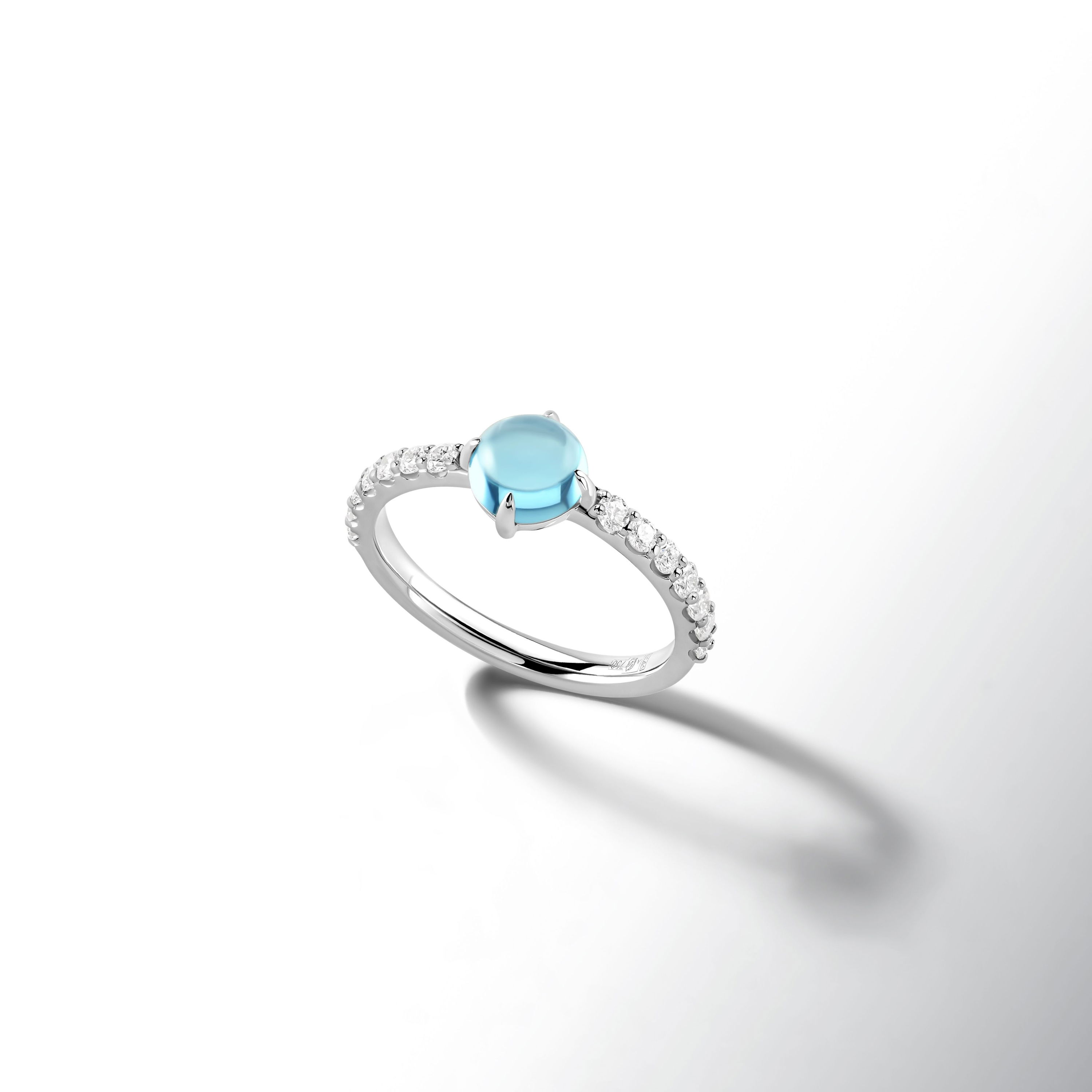 Кольцо из белого золота с топазом и бриллиантом 0.48 карат